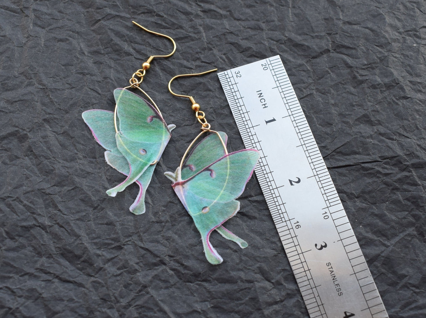 Silk butterflies golden oval drop earrings