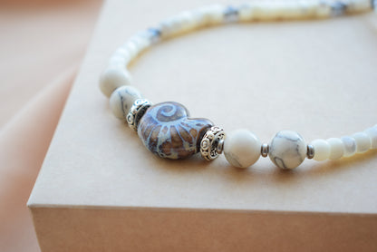 Necklace with decorative shell beads 