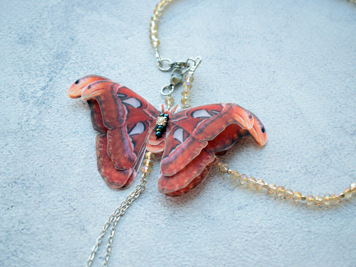 Silk backdrop necklace butterfly moving wings