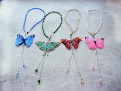 Luna moth moving butterfly wings backdrop necklace