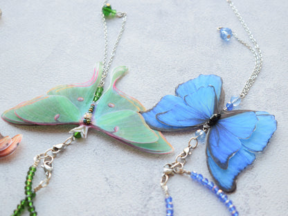 Luna moth moving butterfly wings backdrop necklace