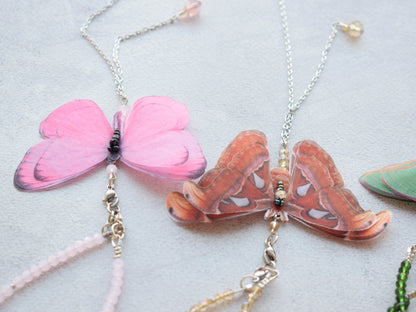 Luna moth moving butterfly wings backdrop necklace