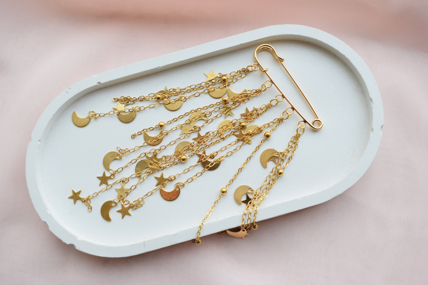 Boho celestial jewelry accessory with gold details