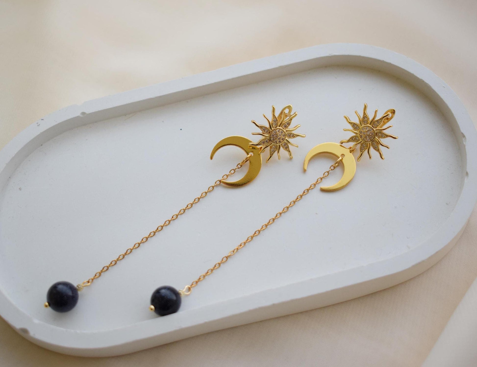 Golden celestial earrings with green aventurine gemstones