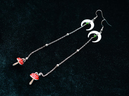 Silver mushroom and moon dangle earrings with green glass beads
