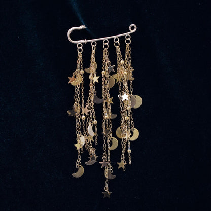 Gold chain brooch with tiny star and moon charms