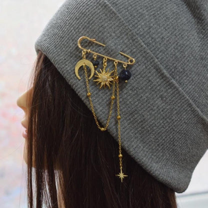 Moon and star pin with layered gold chains