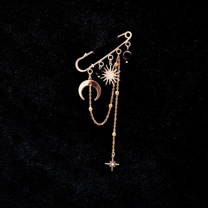 Gold celestial brooch with moon, star, and aventurine gemstone