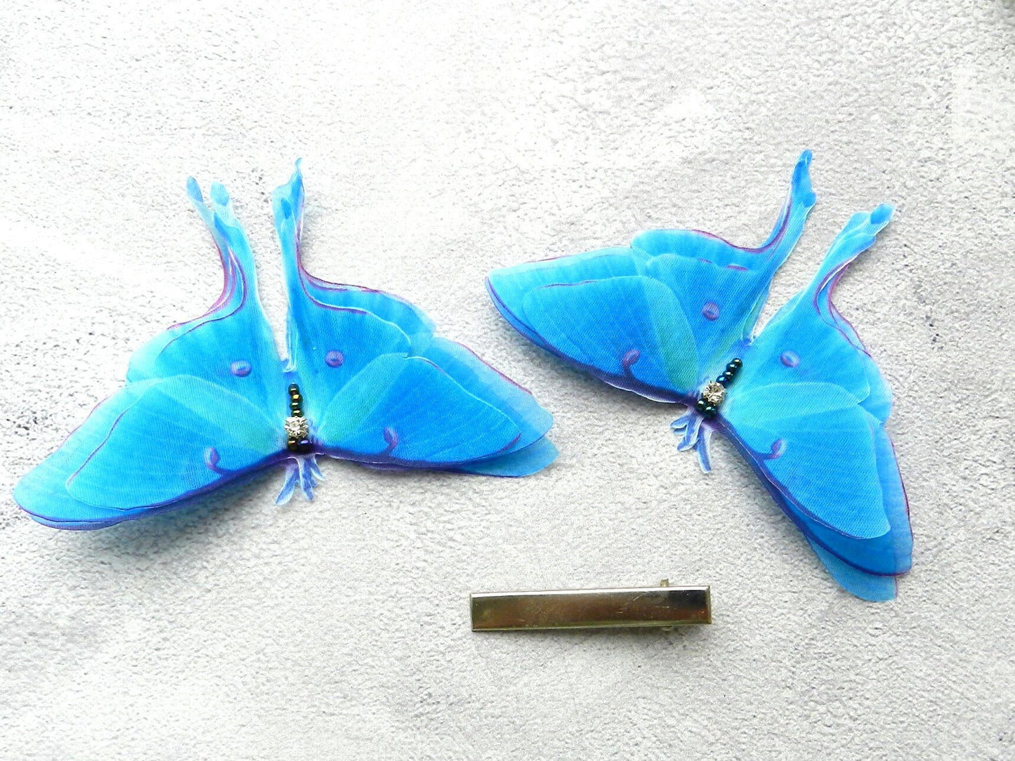 Silk blue luna moth hair clips with 3d layered wings