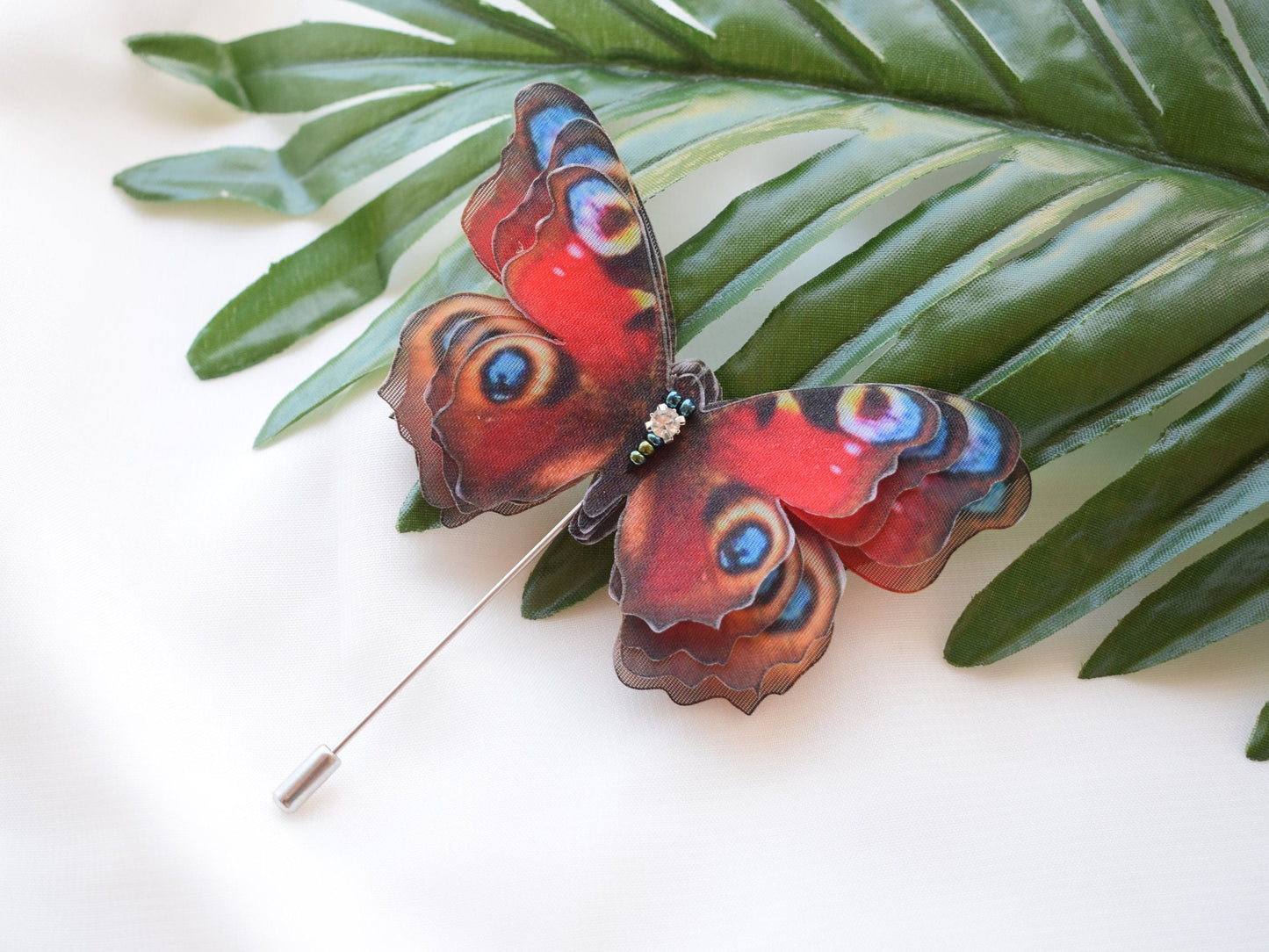 Silk peacock eye butterfly brooch