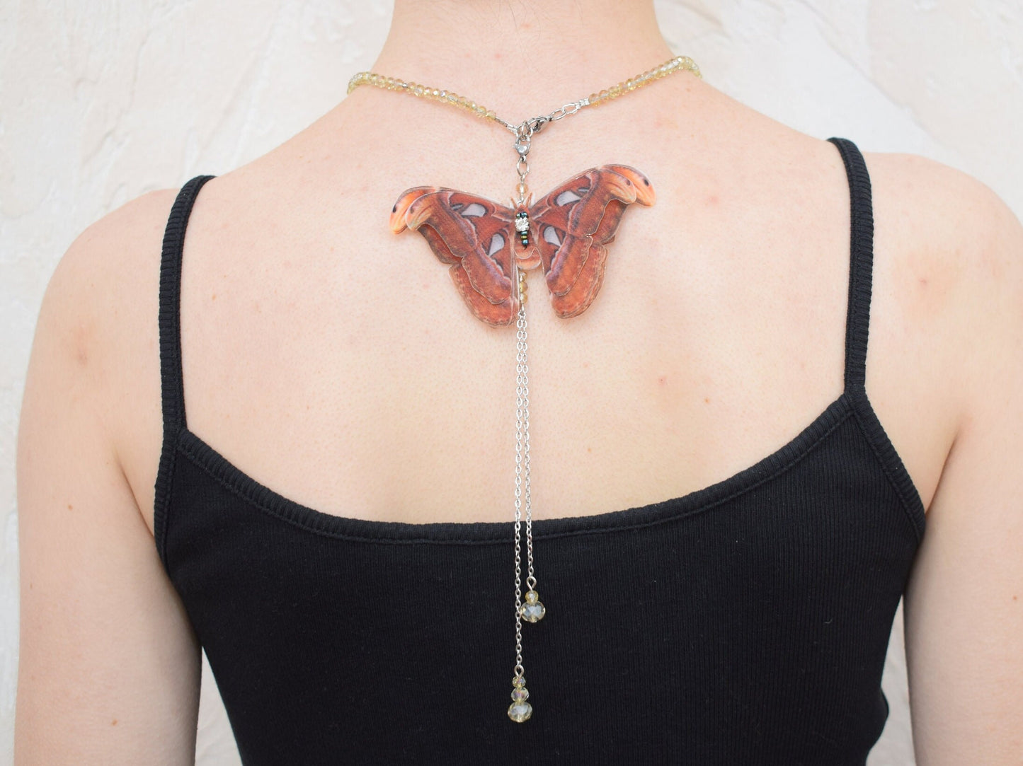 Silk backdrop necklace butterfly moving wings