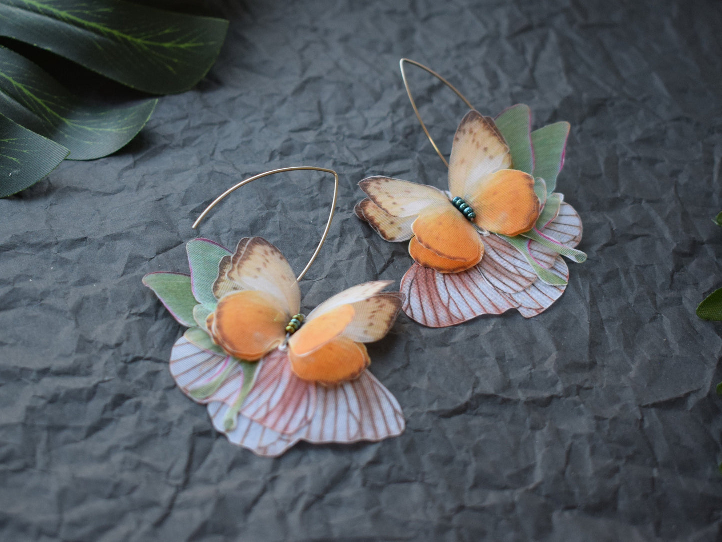 Silk orange butterflies moving wings drop earrings